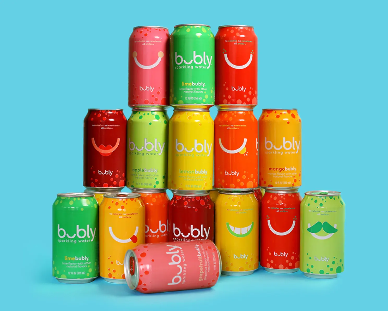 Stack of Bubly cans on a blue background