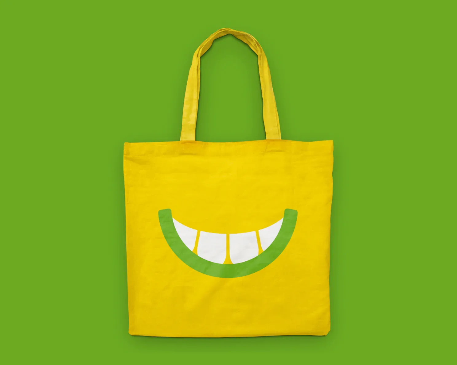 Yellow Tote bag on green background