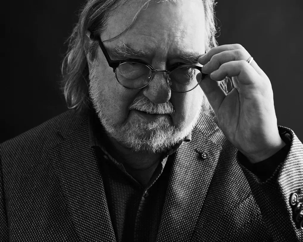 Portrait of James P. Allison, PhD on black background