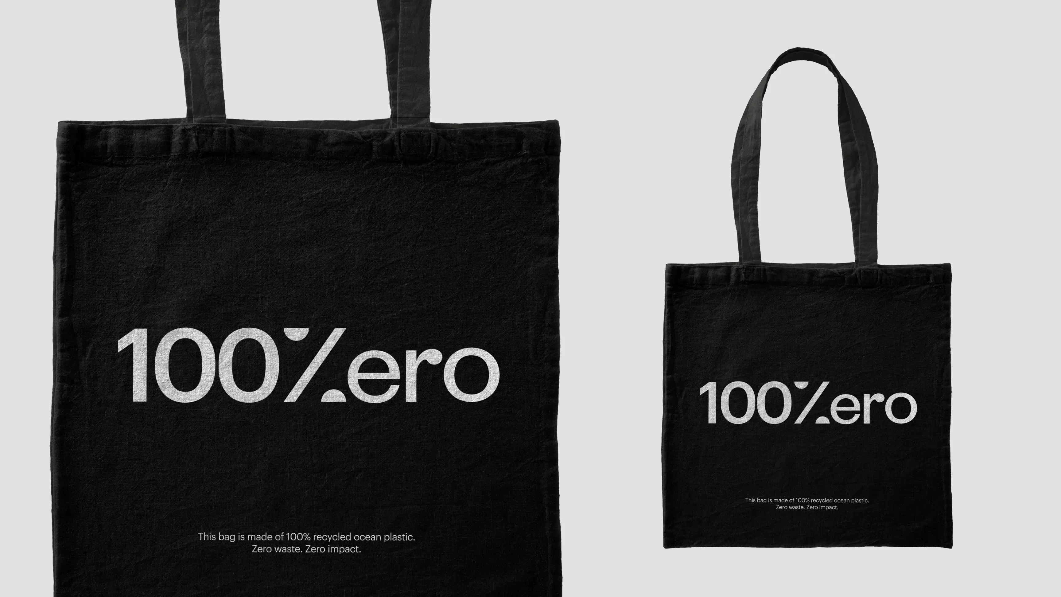 Black Tote bag with 100% Zero written on it